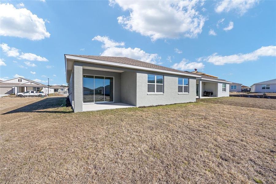 Exterior details and patio area of a home in Calesa Township, Ocala (Image 23).