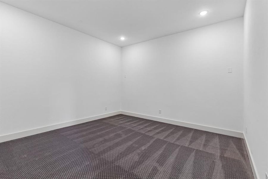 Whether enjoying family movie night or hosting big game day parties, this main floor media room offers outstanding entertaining space.