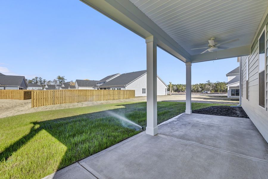 Exterior details and patio area of a home in Grand Park, Leland (Image 3).