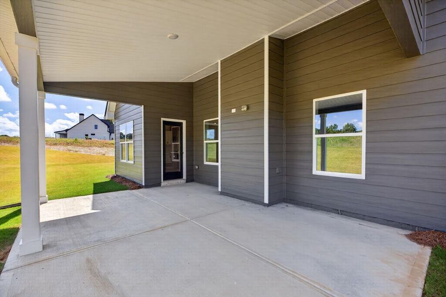 Exterior details and patio area of a home in Blackwelder Bluff, Bowdon (Image 4).