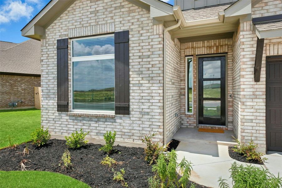 Exterior details and patio area of a home in East View Farms, Georgetown (Image 23).