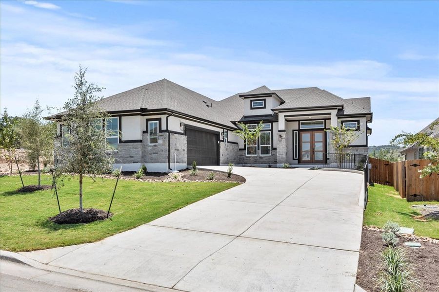 Front exterior of a new home in Sweetwater, Austin, TX, highlighting curb appeal (Image 23).