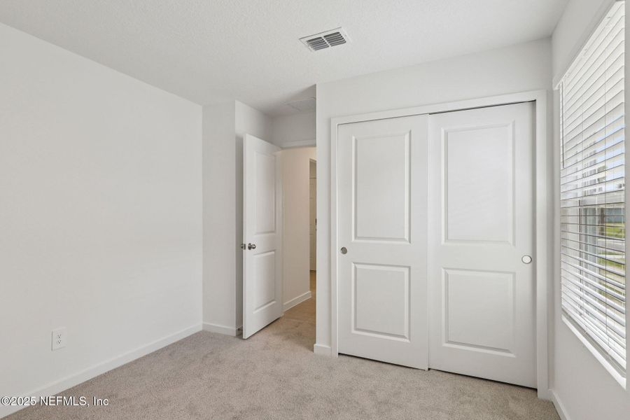 Spacious, unfurnished interior of a new home in Lakes at Bella Lago - Signature Series, Green Cove Springs (Image 22). Spacious, unfurnished interior of a new home in Lakes at Bella Lago - Signature Series, Green Cove Springs (Image 22).