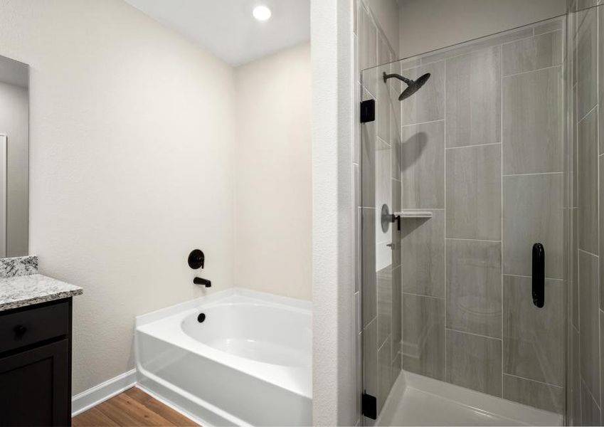 The master bathroom shower has beautiful tile detail