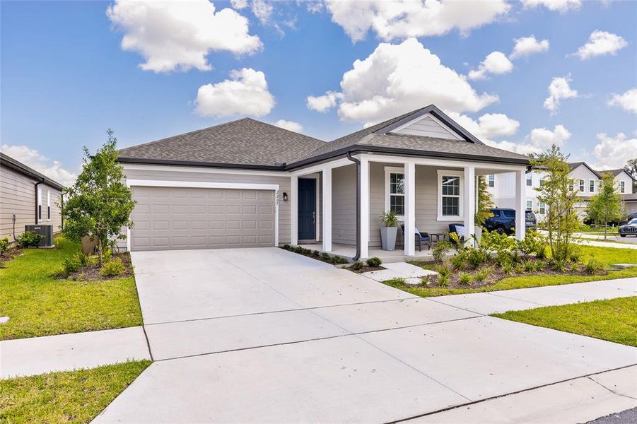 Front exterior of a new home in , St. Cloud, FL, highlighting curb appeal (Image 2). Front exterior of a new home in , St. Cloud, FL, highlighting curb appeal (Image 2).