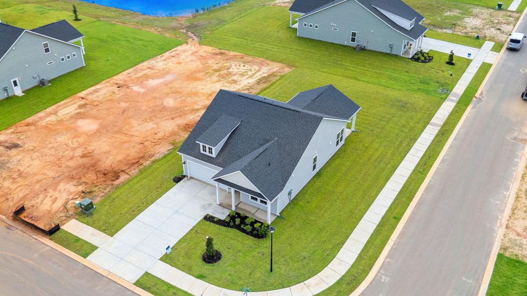 Representative exterior photo of a completed home built from the Easton by DRB Homes in Chestnut Farms, Longs, SC (Image 25). Representative exterior photo of a completed home built from the Easton by DRB Homes in Chestnut Farms, Longs, SC (Image 25).