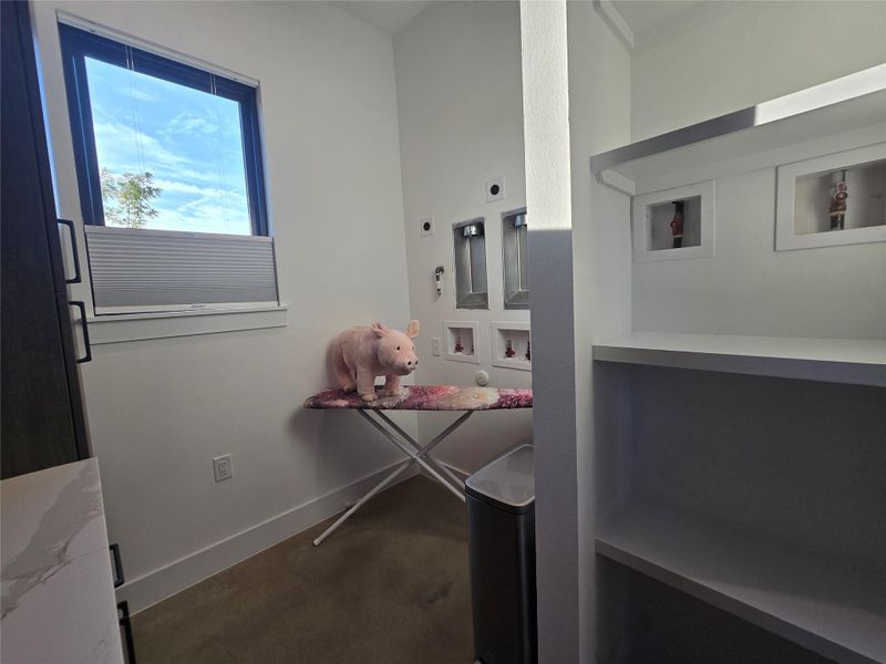 Laundry/utility room is set up for either side by side units, or 2 separate stacked units to reduce the laundry time in half!