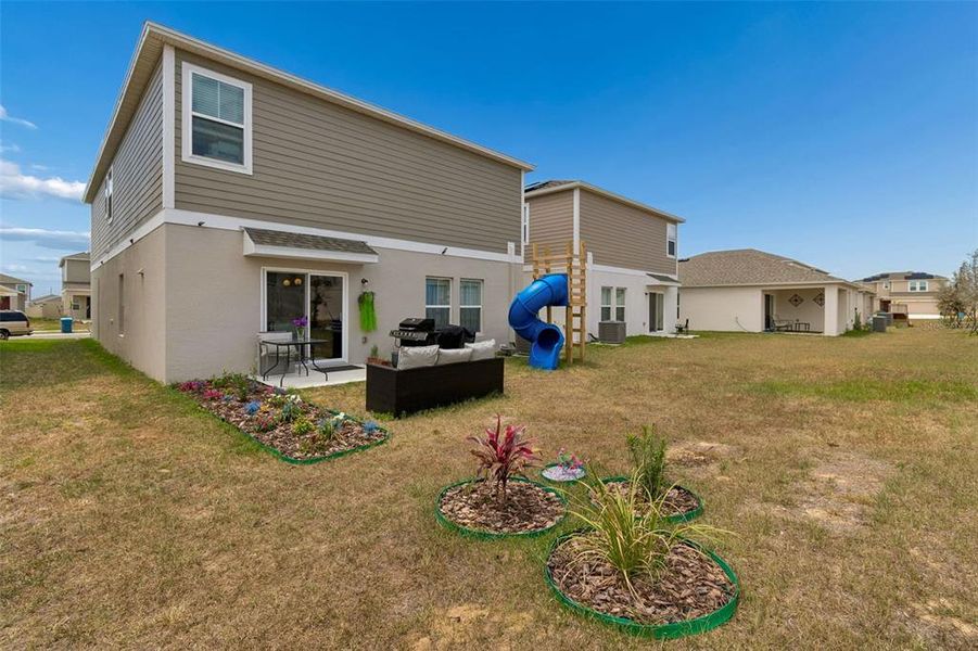 Exterior details and patio area of a home in , Haines City (Image 30).