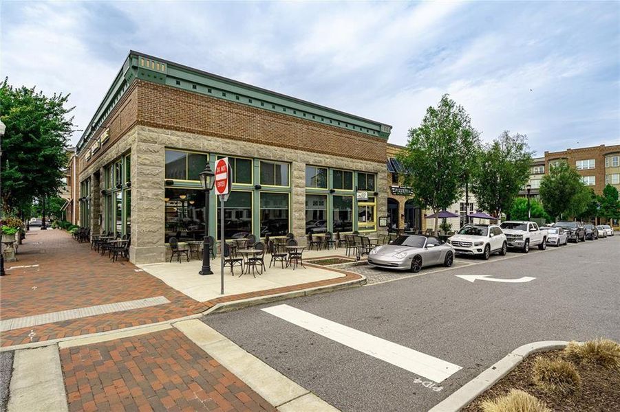 Front exterior of a new home in , Alpharetta, GA, highlighting curb appeal (Image 1).