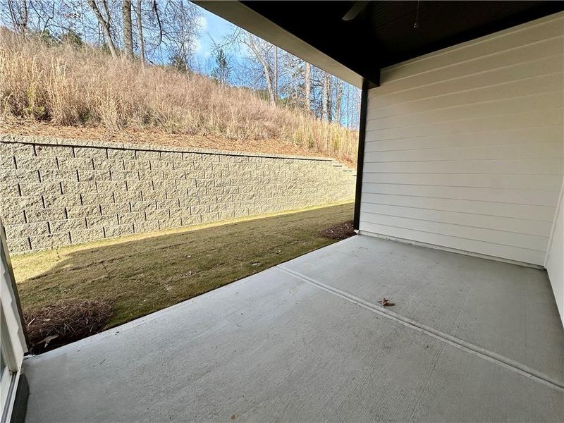 Exterior details and patio area of a home in Marble Tree, Ball Ground (Image 3).