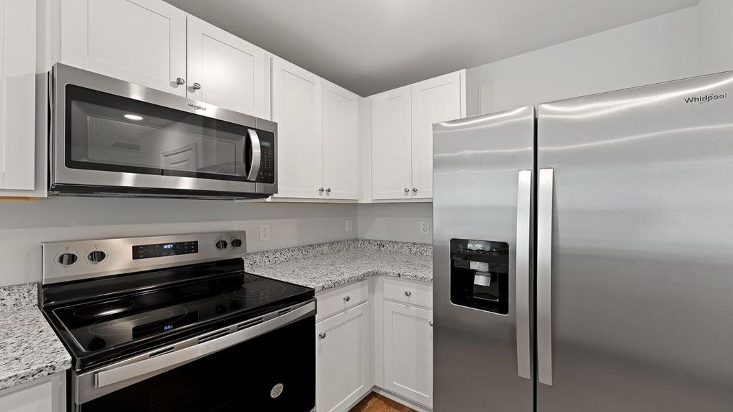 Furnished interior view inside a new home in Pine Hills at Cane Bay, Summerville (Image 4).