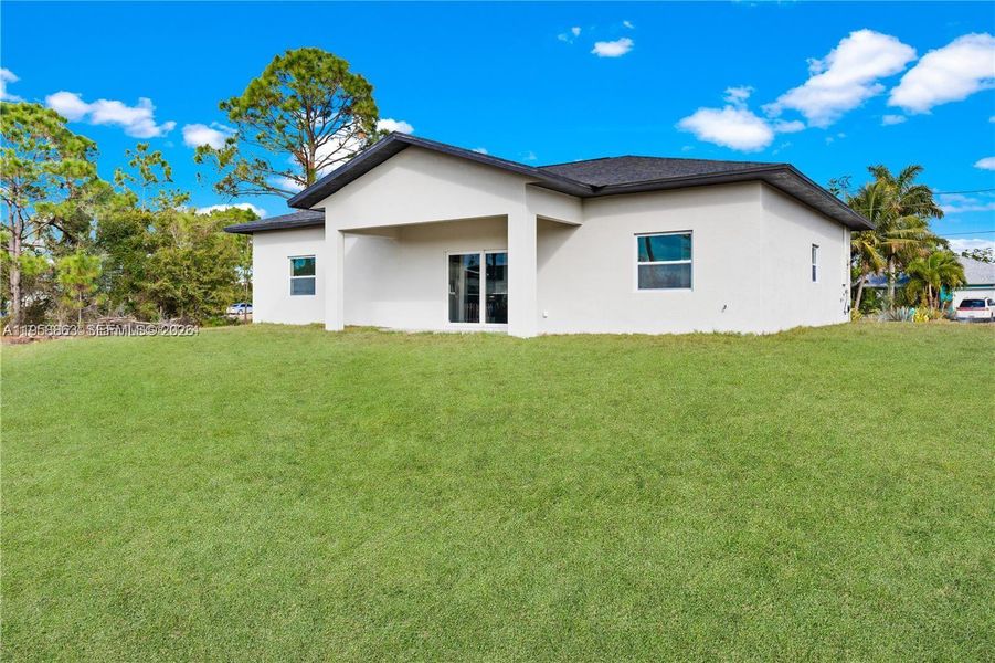 Exterior details and patio area of a home in , Lehigh Acres (Image 4). Exterior details and patio area of a home in , Lehigh Acres (Image 4).