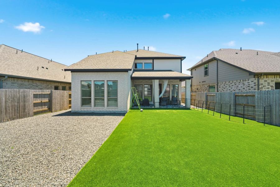 Additional backyard perspective showcasing the home's outdoor living potential