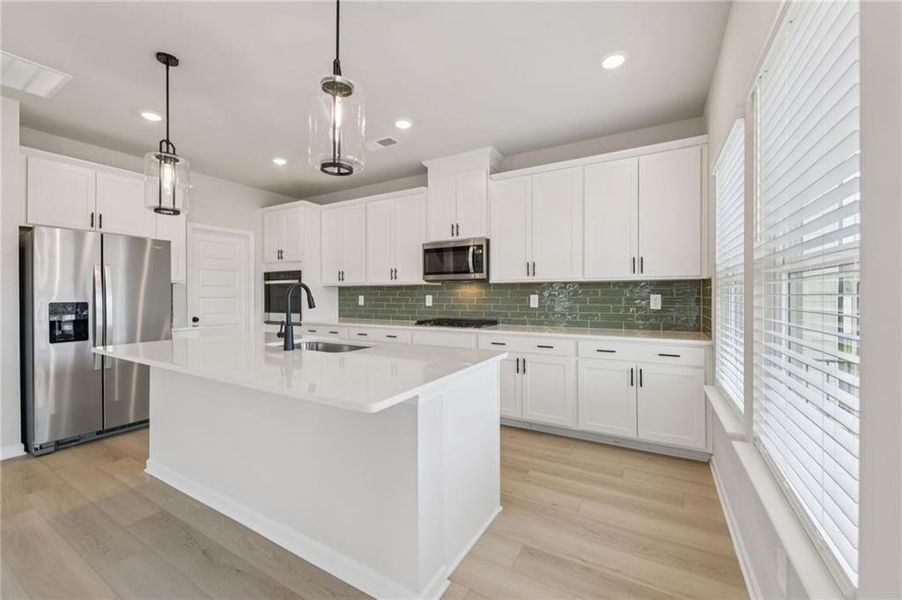 Furnished interior view inside a new home in Vines at Mill Creek - Estate Series, Braselton (Image 8). Furnished interior view inside a new home in Vines at Mill Creek - Estate Series, Braselton (Image 8).
