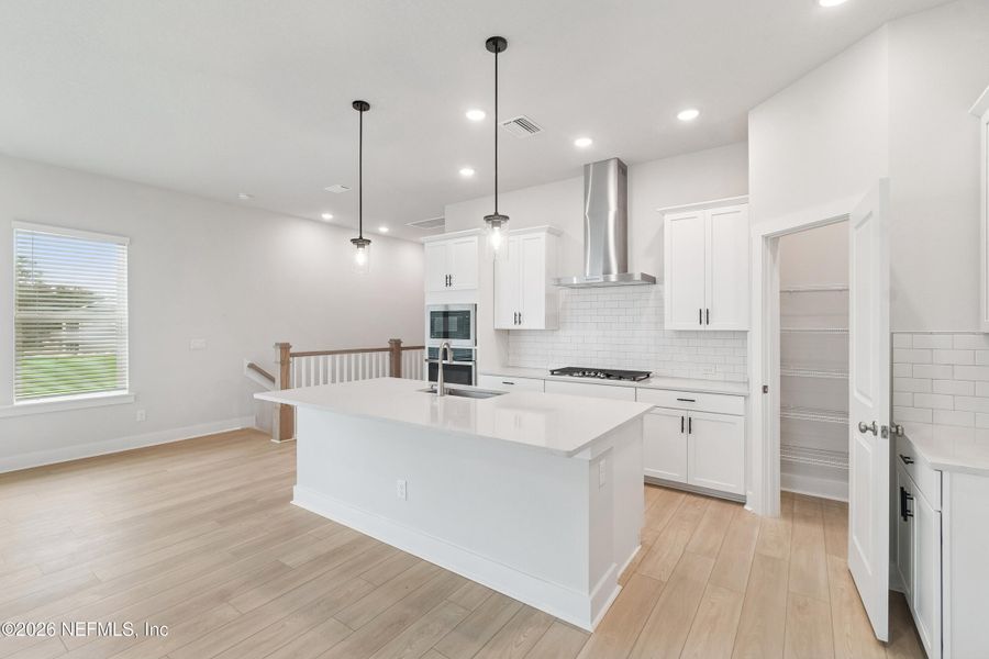 Furnished interior view inside a new home in Kettering at eTown - Paired Villas, Jacksonville (Image 5).