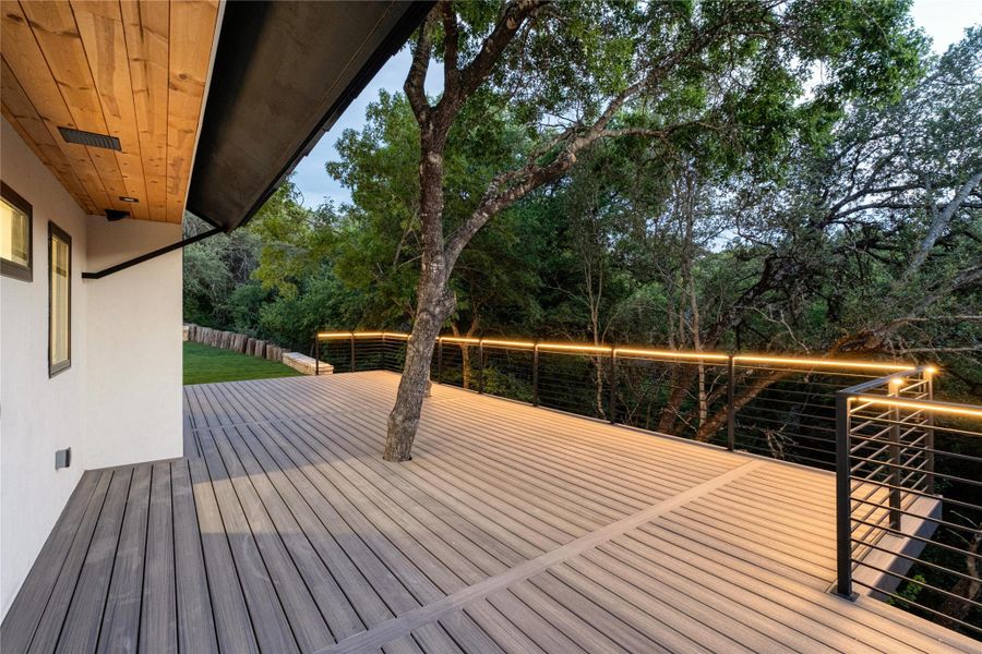 Deck with view of wooded area