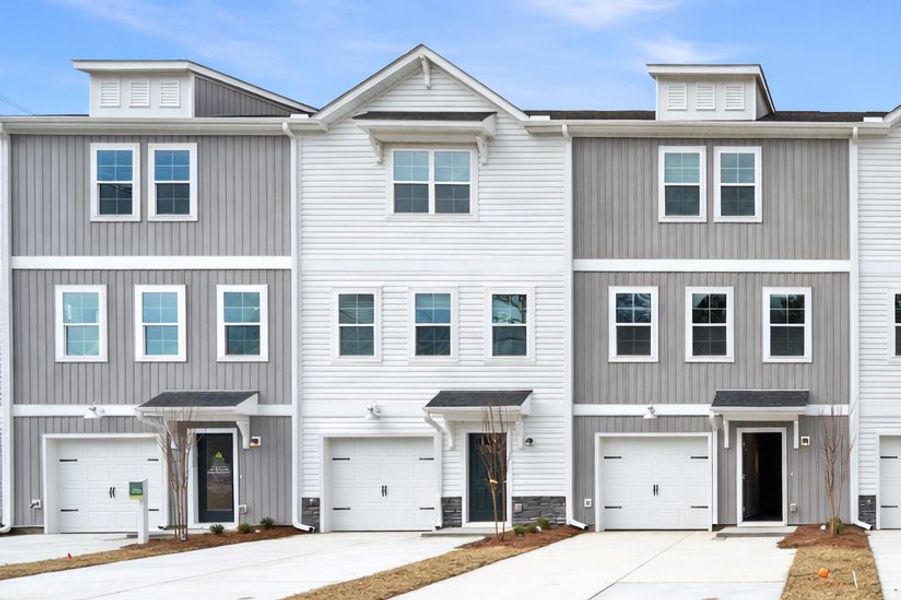 Front exterior of a new home in Liberty Village, Flemington, GA, highlighting curb appeal (Image 2). Front exterior of a new home in Liberty Village, Flemington, GA, highlighting curb appeal (Image 2).