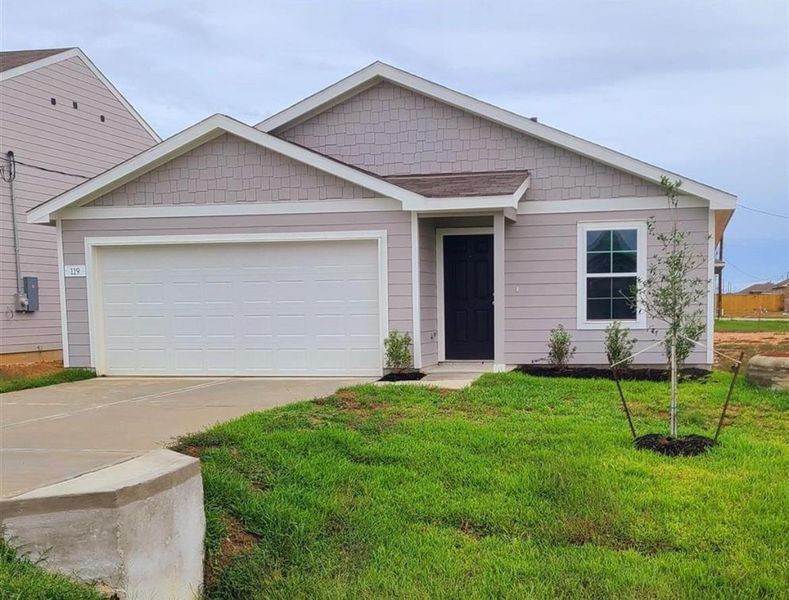 Front exterior of a new home in Shirey Forest - Branches, Lufkin, TX, highlighting curb appeal (Image 1).