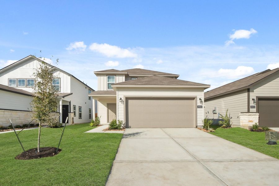 Front exterior of a new home in Northpark South, Porter, TX, highlighting curb appeal (Image 13). Front exterior of a new home in Northpark South, Porter, TX, highlighting curb appeal (Image 13).