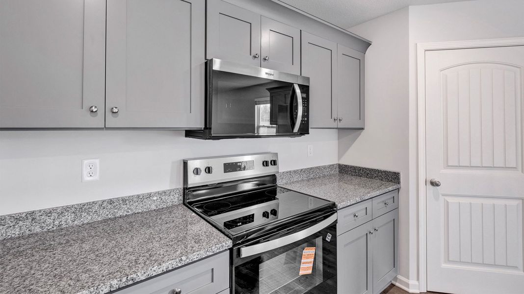 Furnished interior view inside a new home in Huntington Estates, Millington (Image 9).