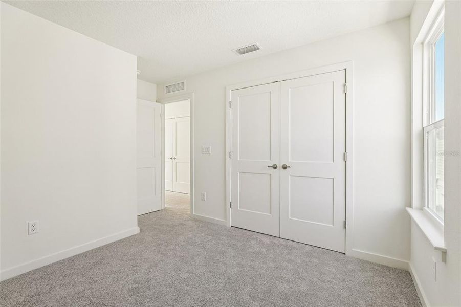 Spacious, unfurnished interior of a new home in Trinity Place, St. Cloud (Image 36).