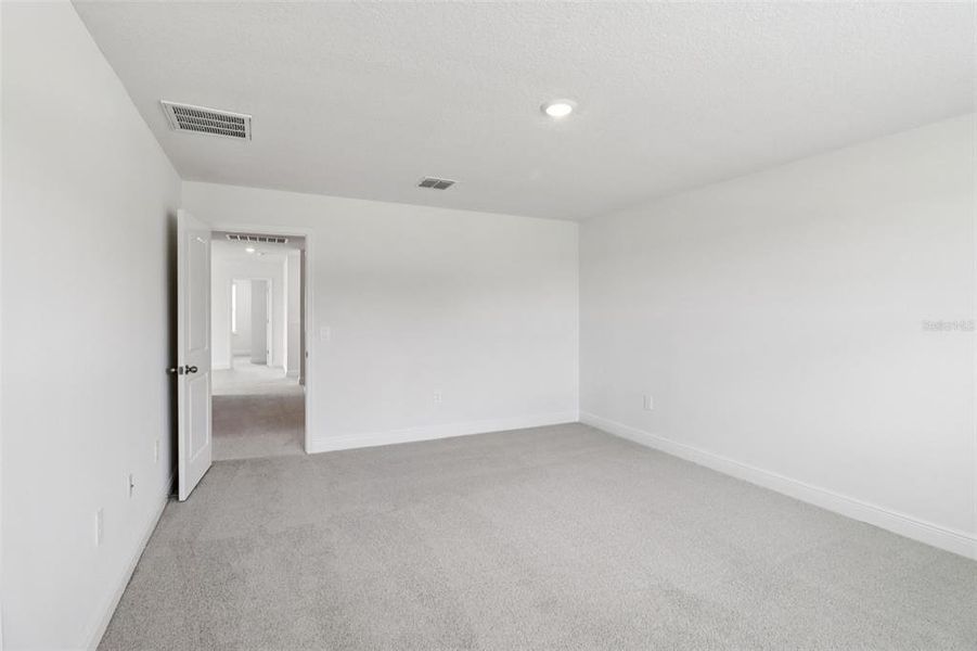 Spacious, unfurnished interior of a new home in The Reserve at Hammock Oaks - Classic Series, Lady Lake (Image 15). Spacious, unfurnished interior of a new home in The Reserve at Hammock Oaks - Classic Series, Lady Lake (Image 15).