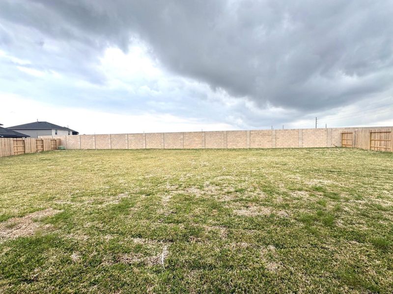 Exterior details and patio area of a home in Sunterra, Katy (Image 3). Exterior details and patio area of a home in Sunterra, Katy (Image 3).