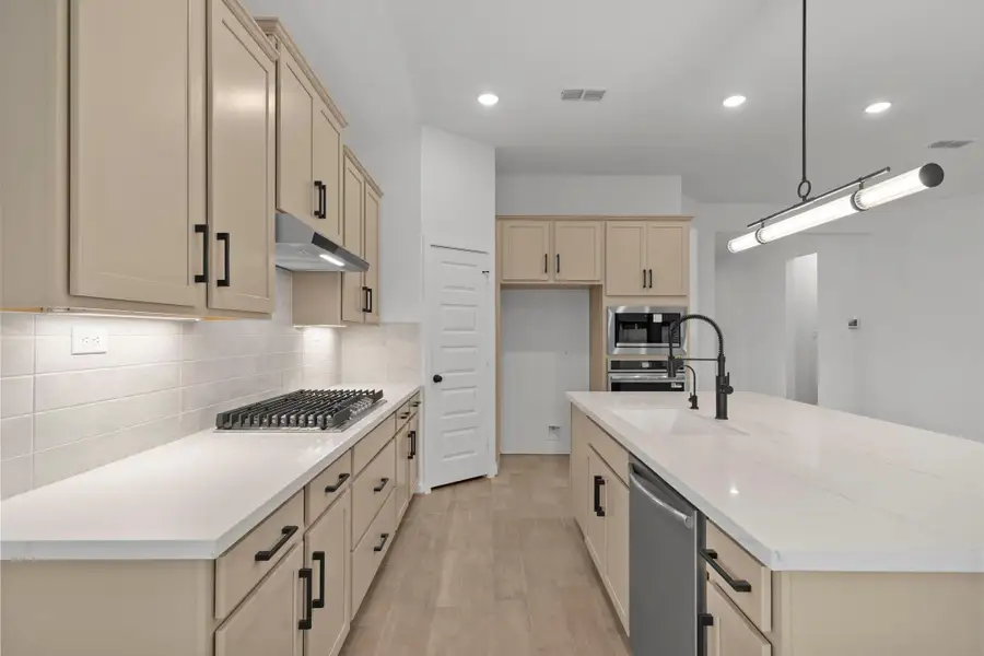 Furnished interior view inside a new home in Harvest Green - Final Opportunities, Richmond (Image 12).