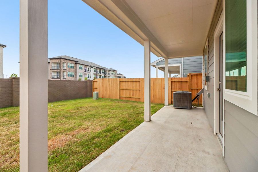 Exterior details and patio area of a home in Parkway Commons - City Series, Missouri City (Image 24).