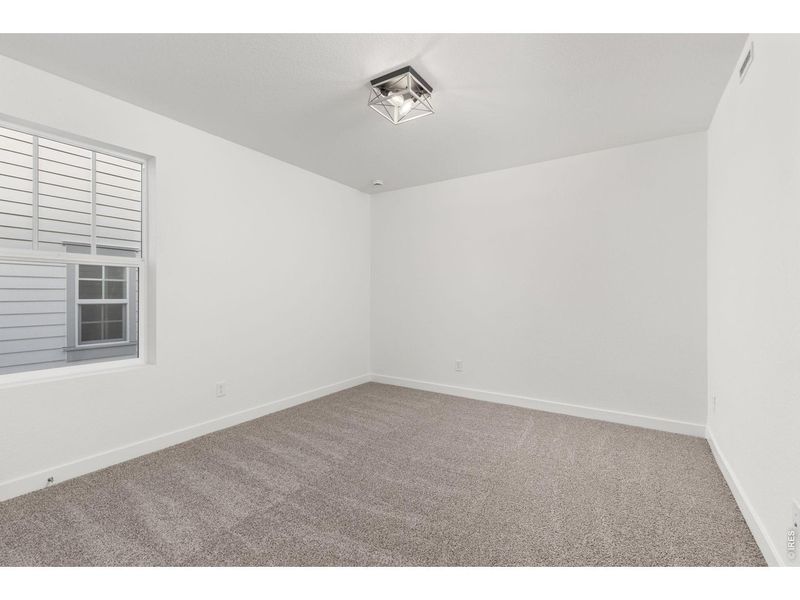 Spacious, unfurnished interior of a new home in Westerly, Erie (Image 18).