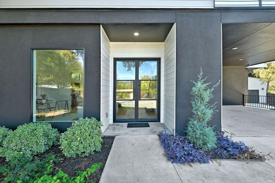 Property entrance with beautiful front doors