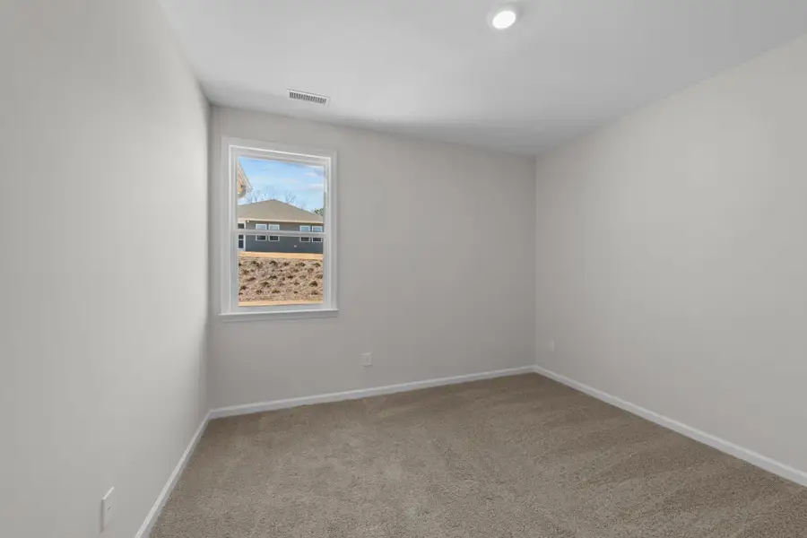 Spacious, unfurnished interior of a new home in Neill's Pointe, Angier (Image 28).