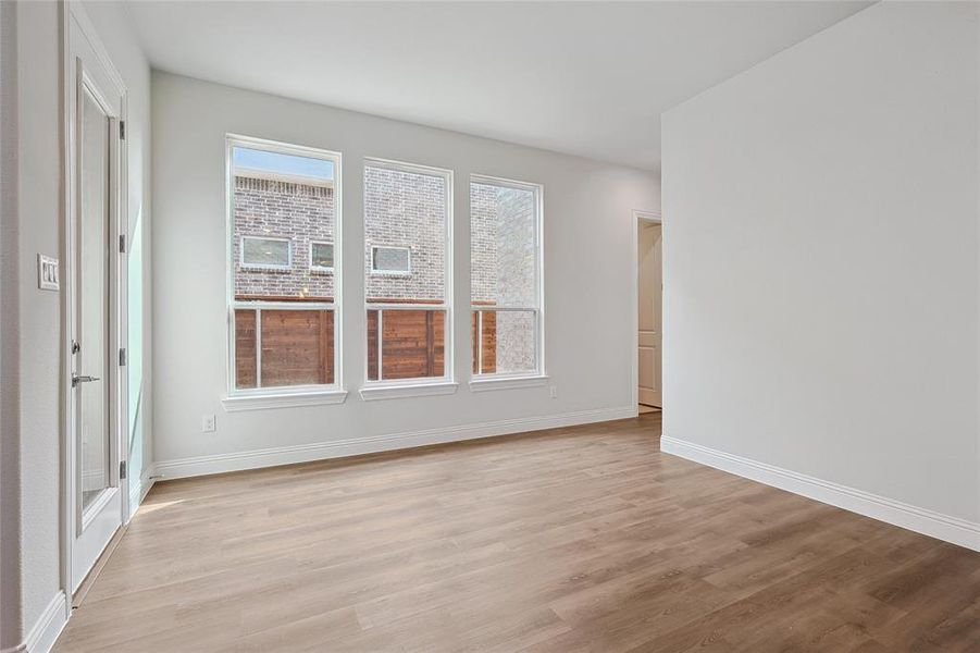 Empty room featuring light wood-style floors Empty room featuring light wood-style floors