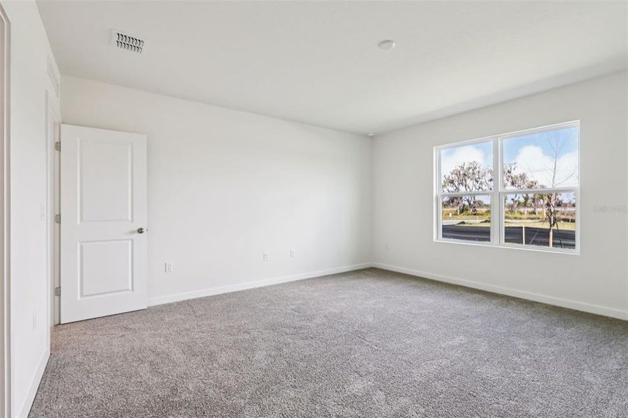 Spacious, unfurnished interior of a new home in Willowbrook North, Winter Haven (Image 26).