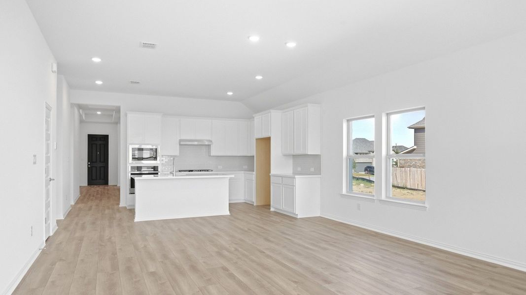Furnished interior view inside a new home in Carillon, Manor (Image 11).
