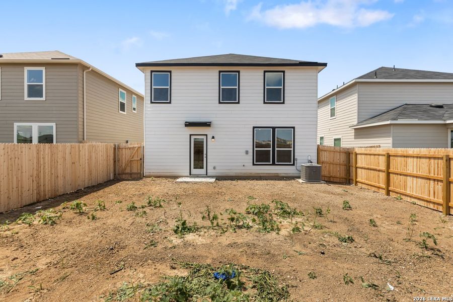 Exterior details and patio area of a home in Medina Crossing, Von Ormy (Image 3).