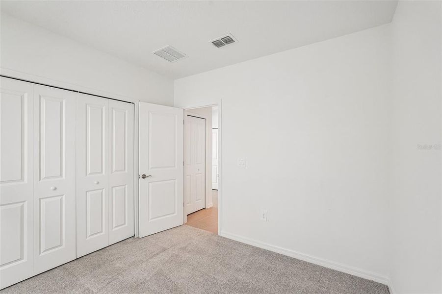 Spacious, unfurnished interior of a new home in Southpointe, Palmetto (Image 12). Spacious, unfurnished interior of a new home in Southpointe, Palmetto (Image 12).