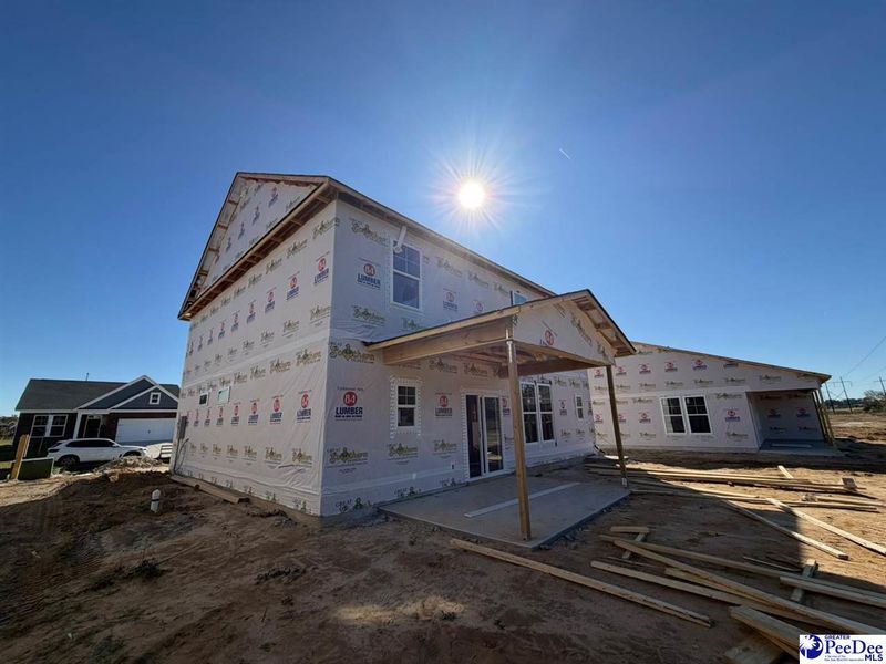 In-progress construction of a new home in The Grove, Florence, SC (Image 12).