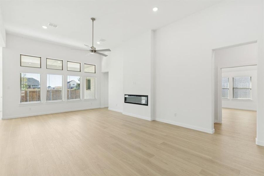 Living Room in the Gilmour II home plan by Trophy Signature Homes – REPRESENTATIVE PHOTO Living Room in the Gilmour II home plan by Trophy Signature Homes – REPRESENTATIVE PHOTO