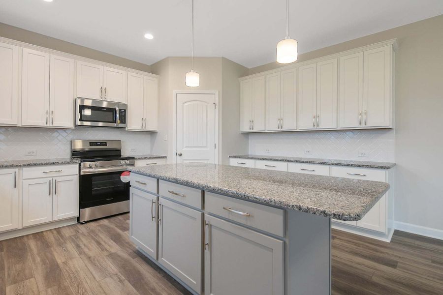Representative furnished interior of a home built from the Drayton by Caviness & Cates Communities in Bartlett Manor, Youngsville (Image 169).