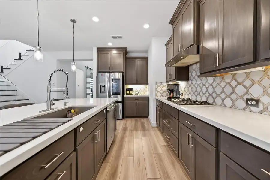 Furnished interior view inside a new home in Avalon at Cypress, Cypress (Image 18).