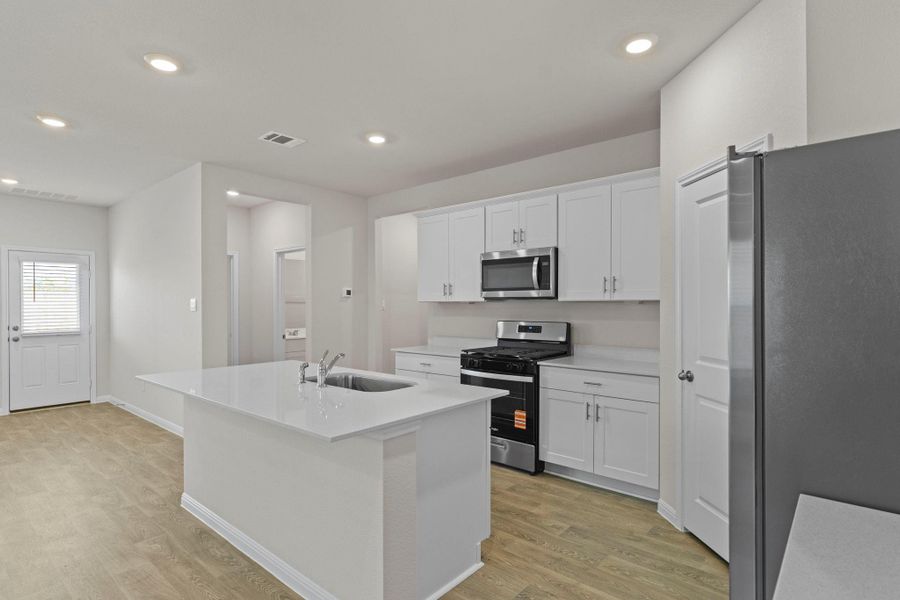 Furnished interior view inside a new home in Whisper South, San Marcos (Image 7).