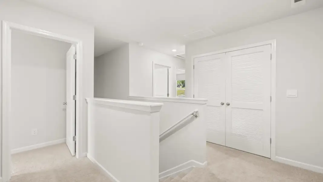 Representative unfurnished interior of a home built from the Pattison by D.R. Horton in Branford Crossing, Stockbridge (Image 9).