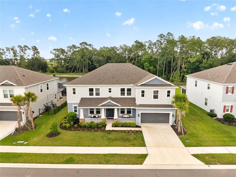 Front exterior of a new home in , Wesley Chapel, FL, highlighting curb appeal (Image 21). Front exterior of a new home in , Wesley Chapel, FL, highlighting curb appeal (Image 21).