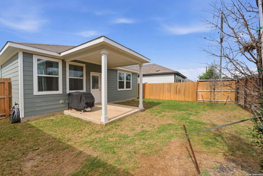 Exterior details and patio area of a home in Spring Creek, San Antonio (Image 4).