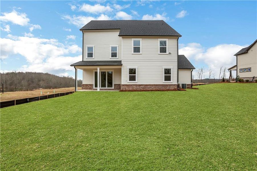 Exterior details and patio area of a home in Acacia, Cumming (Image 27).