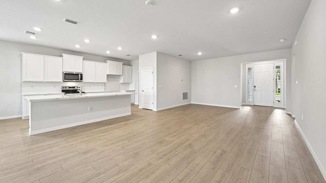 Representative unfurnished interior of a home built from the Laurel by D.R. Horton in Star Farms at Lakewood Ranch, Bradenton (Image 16).