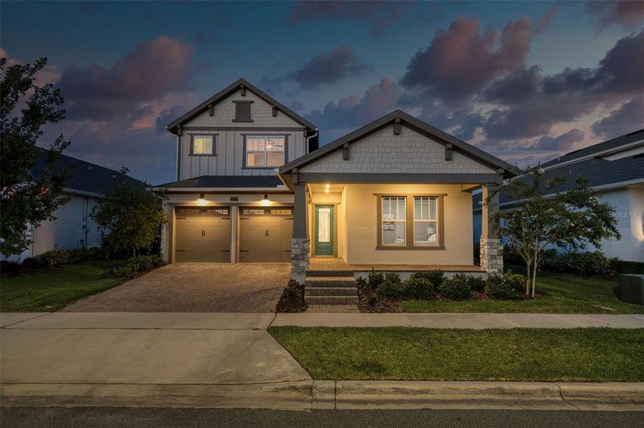 Front exterior of a new home in Laureate Park, Orlando, FL, highlighting curb appeal (Image 23). Front exterior of a new home in Laureate Park, Orlando, FL, highlighting curb appeal (Image 23).