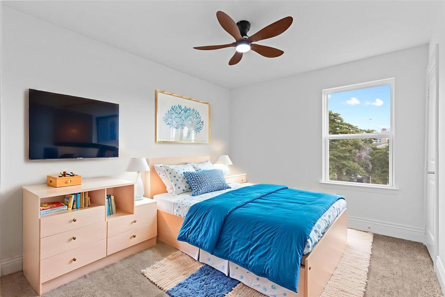 Discover upstairs down the private hallway two guest bedrooms with high ceilings and all with chic style ceiling fans and light! * virtual stage*