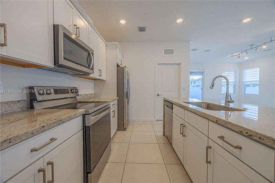 Furnished interior view inside a new home in , Jupiter (Image 9). Furnished interior view inside a new home in , Jupiter (Image 9).